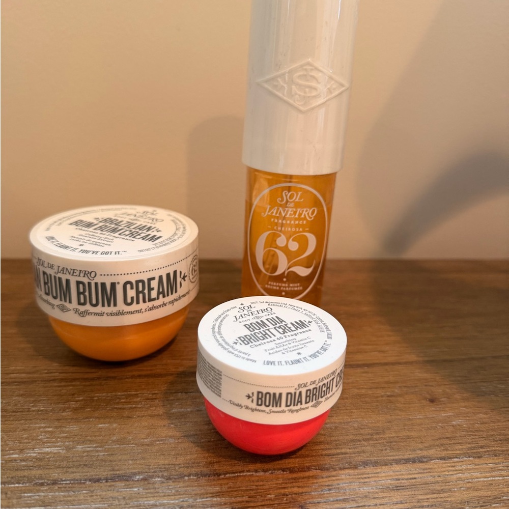 Sol de Janeiro trio: Bum Bum Cream (Orange) and 62 & Bom Dia Bright Cream (Pink)